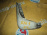Брызговик HONDA Stream RN1 перед, лев (Белый)