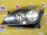 Фара Opel Astra H A04/L35/L48 '2004-2007 лев тёмная галоген (дефект, верх.крепление) 24451030