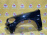 Крыло BMW X5 E70 '2007 перед, лев чёрное, с омывателем фары (царапины) 51657178395 (Черный)