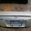 Крышка багажника Mazda Familia BJ3P