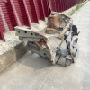 Рамка радиатора TOYOTA Duet M100A (с чашками стоек) 53205-97403