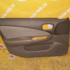 Обшивка двери Nissan Sunny B15 перед, лев