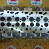 Головка блока Mitsubishi 4D56U L200 '2007- НОВАЯ с распредвалами 1005B453