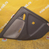 Обшивка двери Toyota Platz NCP10 зад, лев