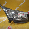 Фара Chevrolet Cruze J300 '2009-2012 прав LHD, чёрная внутри, мех. корректор, без габарита (трещинки на стекле, дефект бок. крепл.)