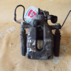 Суппорт Peugeot T7/4C 308 EP6/5FW зад, лев TRW 38 027/B с креплением 9424/A под диск 268 мм
