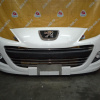 Бампер Peugeot 207 A7 '2009-2013 перед в сборе (туманки)