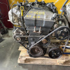 Двигатель Mazda FP-461858 2WD КАТУШКИ С БОКУ  без генератора Capella