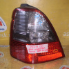 Стоп HONDA P0711 L Odyssey RA7/RA8 2-х цветные (тонированный), Дефект стекла(глубокие царапины)