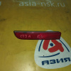 Отражатель в бампер Mitsubishi Lancer CY4A зад, лев 1197-229