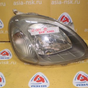 Фара TOYOTA прав Vitz NCP10 '1999-2001 Дефект крепления