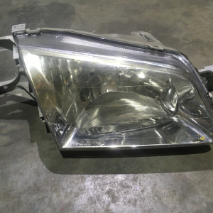 Фара Mazda прав Familia BJ5W '1998-2000