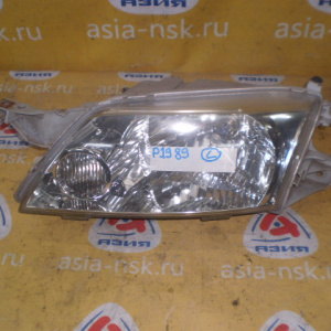 Фара Mazda лев Premacy CP8W '2002
