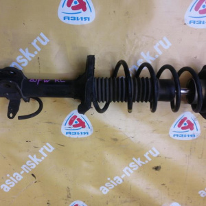 Стойка Mazda BJFW/BJ5W/BJ8W Familia S-Wagon зад, лев С ухом стабилизатора в низу. B25D28900E.B25D28900G.B28V28900A