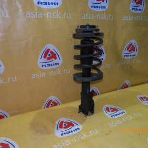 Стойка Mazda BJ5W Familia S-Wagon перед, лев ухо под стабилизатор в низу.