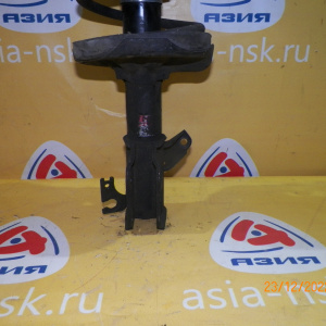 Стойка Mazda BJ5W Familia S-Wagon перед, лев ухо под стабилизатор в низу.