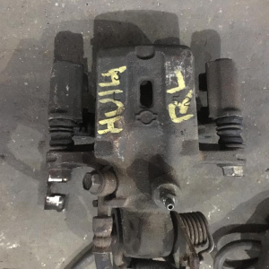 Суппорт Nissan A33/EU14/HP11/P11/HU14/WQP11 зад, лев 44011-0N600 под диск 258 *9 Bluebird