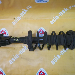 Стойка Mazda LWEW/LW3W/LW5W/LWFW MPV перед, лев ухо под стабилизатор в верху. с2002 по 2005г.