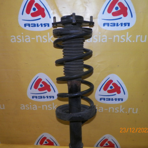 Стойка Mazda LWEW/LW3W/LW5W/LWFW MPV перед, лев ухо под стабилизатор в верху. с2002 по 2005г.