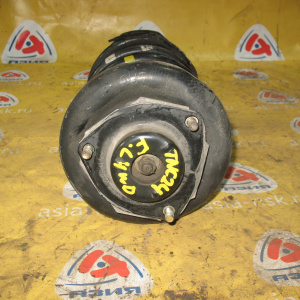 Стойка Nissan TNC24 Serena перед, лев 4WD