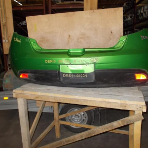 Бампер Mazda Demio DE3 зад [деф.]