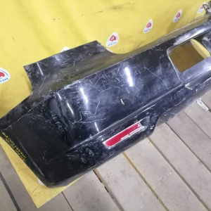 Бампер MITSUBISHI Airtrek CU4W '2002-2005 зад Дефект (цельный)
