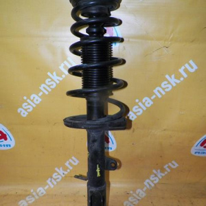 Стойка TOYOTA AE111 Corolla Spacio зад, лев 20мм. С ухом под стабилизатор.