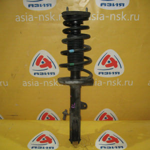 Стойка TOYOTA AE111 Corolla Spacio зад, лев 20мм. С ухом под стабилизатор.