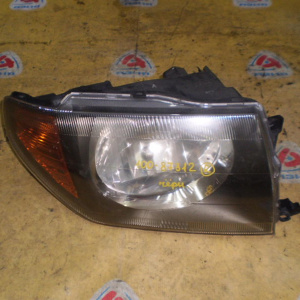 Фара MITSUBISHI прав Pajero IO H76W черн.