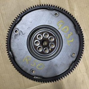 Маховик NISSAN QD32 a/t 7болт 12331-1W402