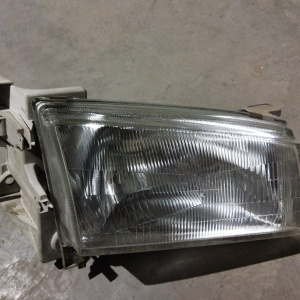 Фара Mazda прав Demio DW3W '1996