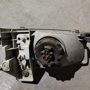 Фара Mazda лев Demio DW3W '1996