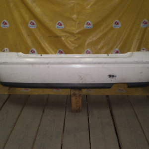 Бампер Mazda Capella GF8P '1997-1999 зад sedan GE4T-50221