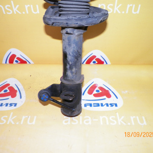 Стойка Mazda CP8W Premacy зад, лев Ухо в низу.