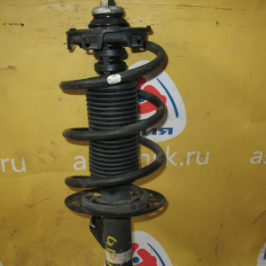 Стойка HONDA GD1/GD3 Fit '06.2001-05.2004 перед, лев ухо кривое