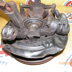 Ступица Toyota ST195/CT195/ST215 Caldina/Carina/Corona перед, лев 4WD Без ABS. В сборе. 5x100.Диаметр диска-255мм.Толщина-25мм. Суппорт-(57-25). 43212-20200.