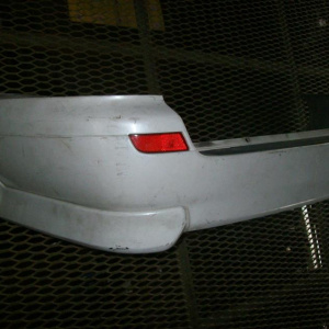 Бампер Nissan Avenir/Expert W11 '1998-2005 зад обвес