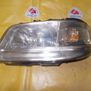 Фара NISSAN лев Cube Z10 '2001 хром