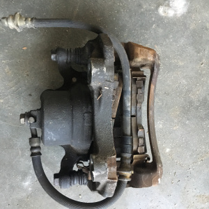 Суппорт NISSAN V10 перед, лев