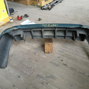 Бампер Mazda Capella GF8P '2000-2002 зад sedan (сонары)