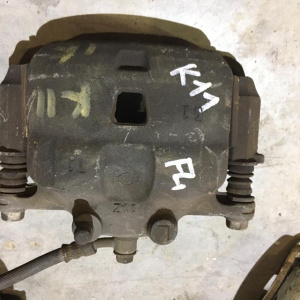 Суппорт NISSAN K11/Z10 перед, лев большой