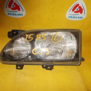 Фара NISSAN лев Serena C23 черн.