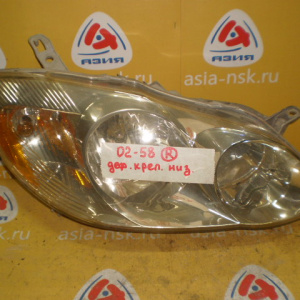 Фара Toyota 02-58 (81110-02200) прав Corolla ZZE132 '2002-2007 USA Дефект нижнего крепления