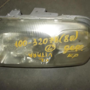 Фара SUZUKI лев Escudo/Vitara T##2W '1998 деф.крепл.