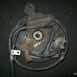 Тросик Ручника SUBARU SG5 Forester зад, лев диск