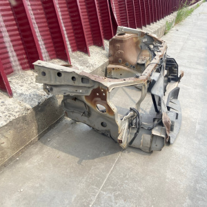 Рамка радиатора TOYOTA Duet M100A (с чашками стоек) 53205-97403