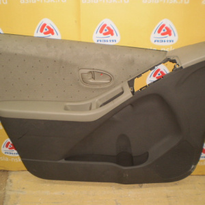 Обшивка двери Toyota Vitz KSP90 перед, лев