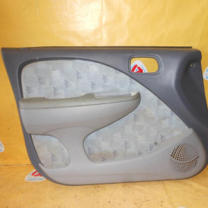 Обшивка двери Toyota Raum EXZ10 перед, лев