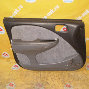 Обшивка двери Toyota Raum EXZ10 перед, лев