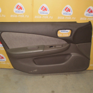 Обшивка двери Nissan Sunny B15 перед, лев